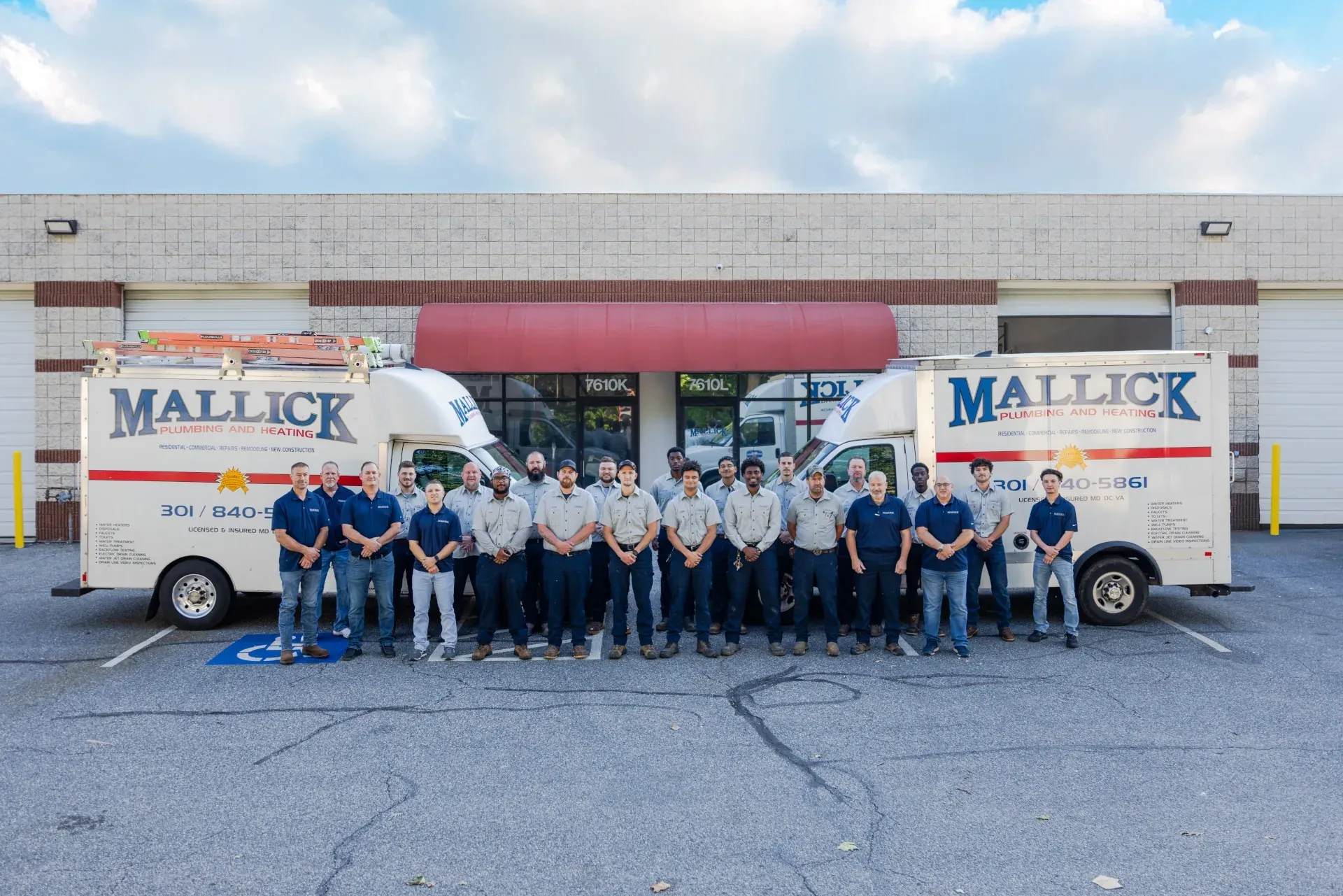 Mallick Plumbing & Heating service vans outside the Gaithersburg shop